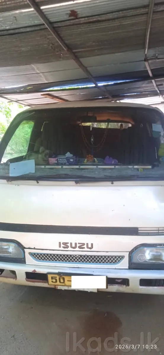ISUZU VAN – 50 NUMBER – SHORT MODEL – HAMBANTOTA | 3 Rows of Seats | Passenger Seat Belts Installed | Minor Work Needed